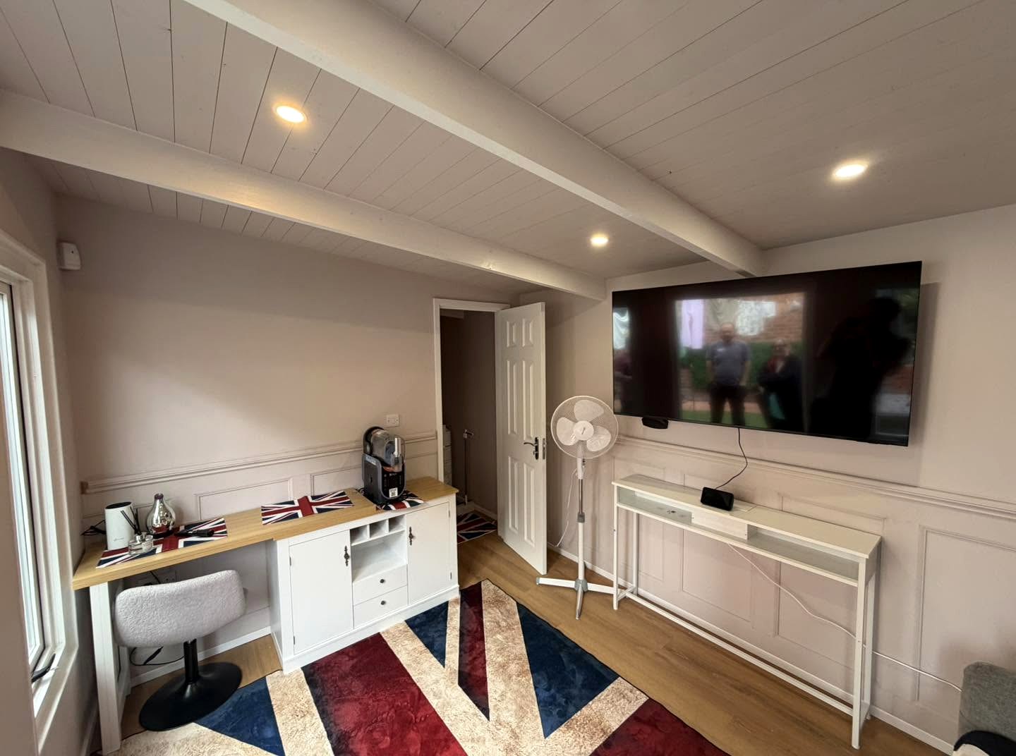 Recessed ceiling lights in a garden room.